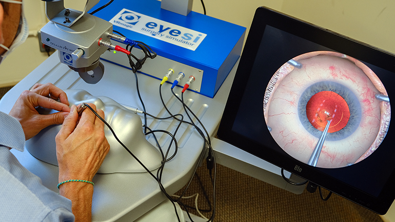 Residents practicing a cataract extraction in the ophthalmology simulation lab