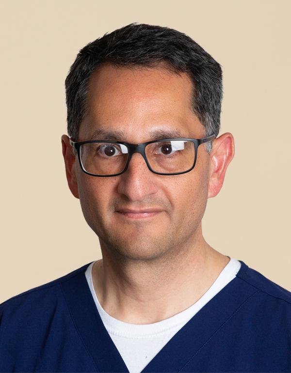 Dr.  Alejandro Oliver